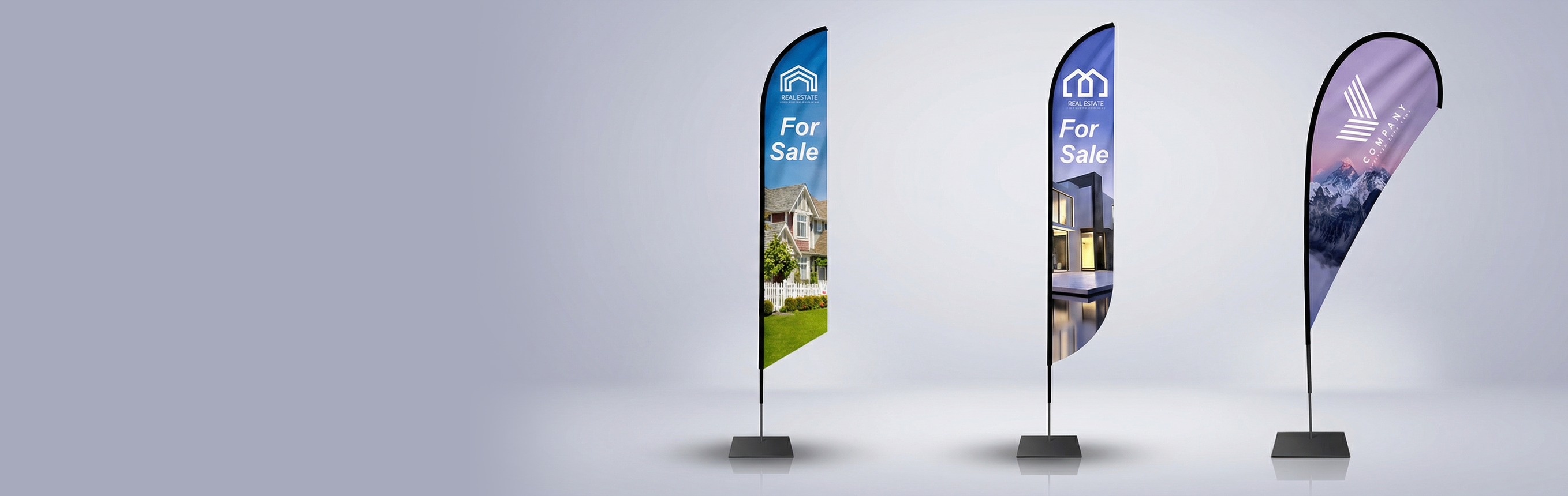 Three feather flags with real estate and scenic designs on a gray background